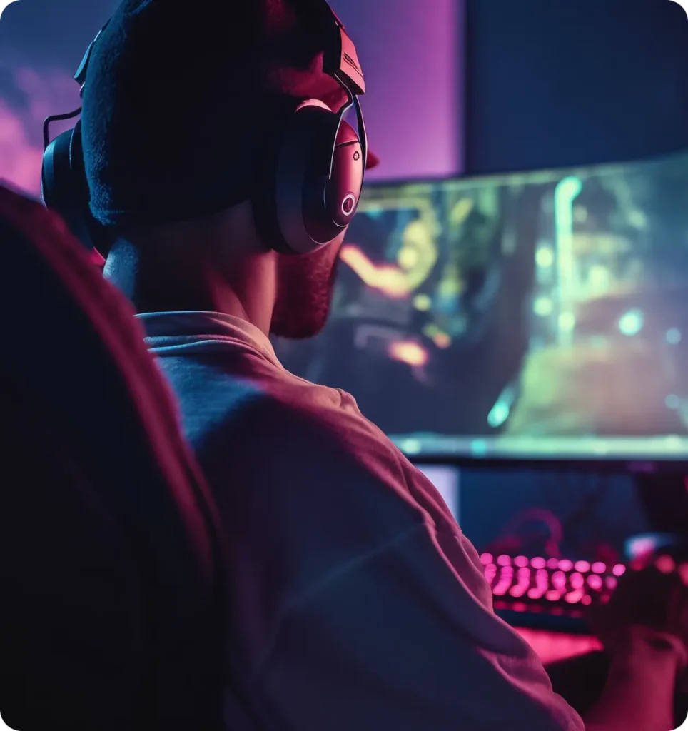 Gracz e-sportowy ze słuchawkami gra przy komputerze z RGB podświetleniem